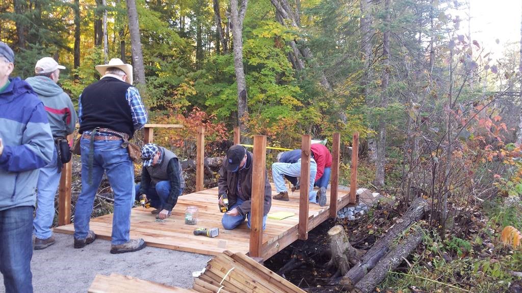 Rotary helping with decking on bridge at Tiffin
