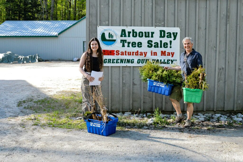 Father and daughter purchases trees at the 2022 Arbor Day Tree Sale