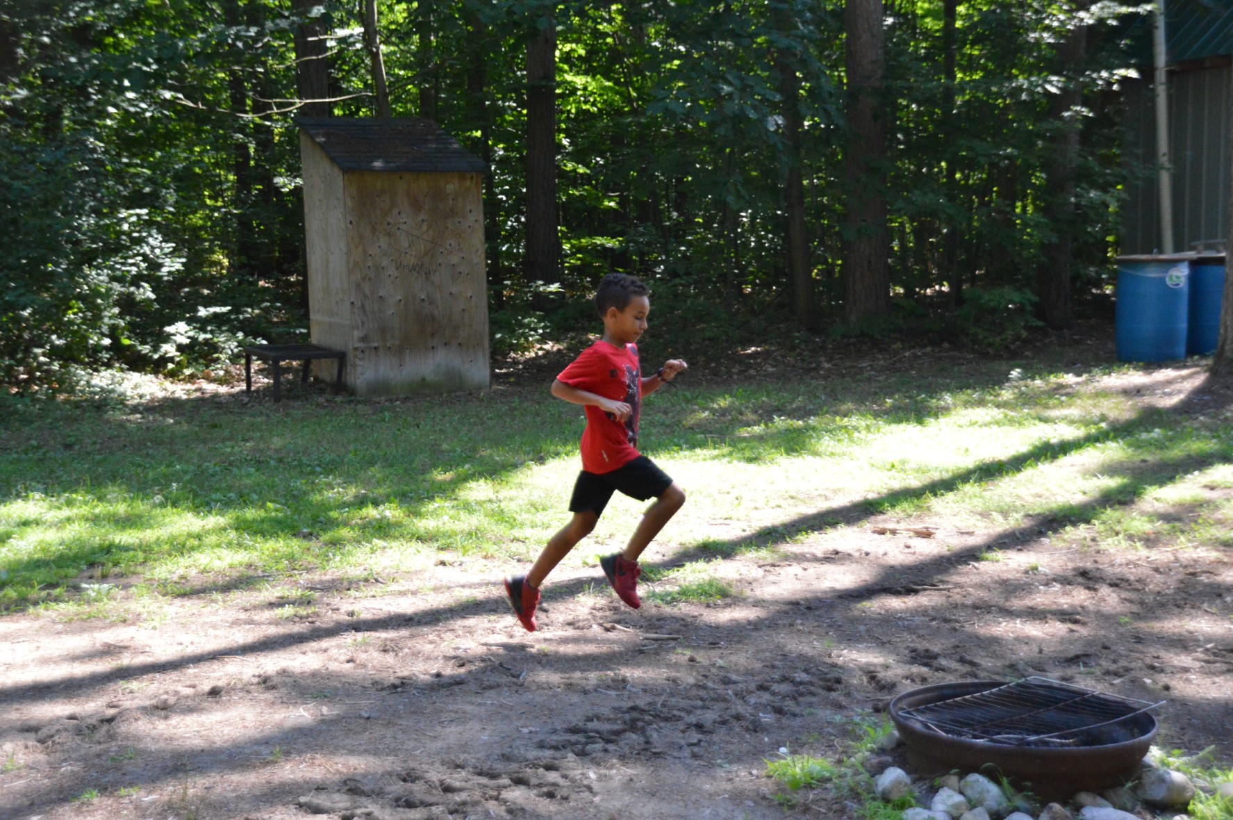 Child running in the forest
