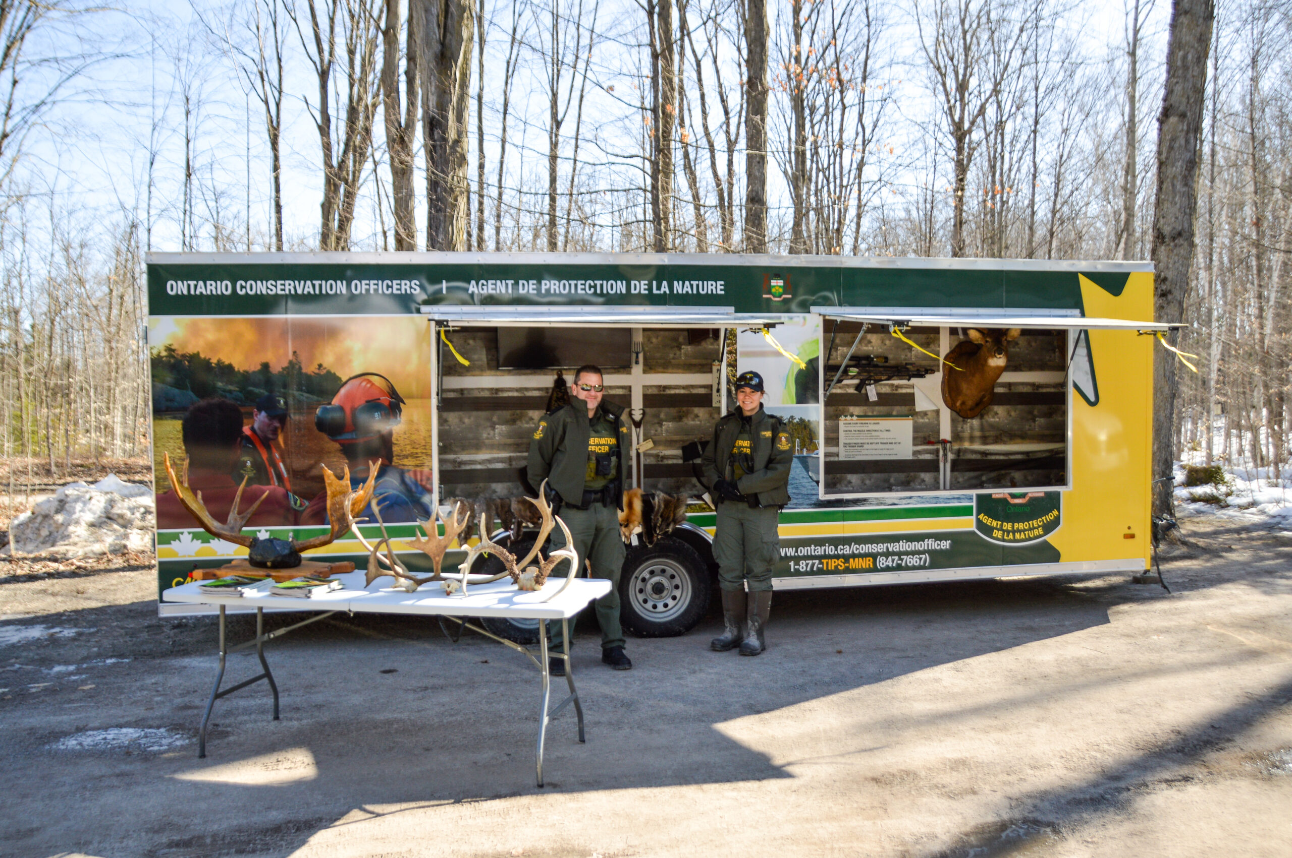 Army cadets next to their trailer with a display